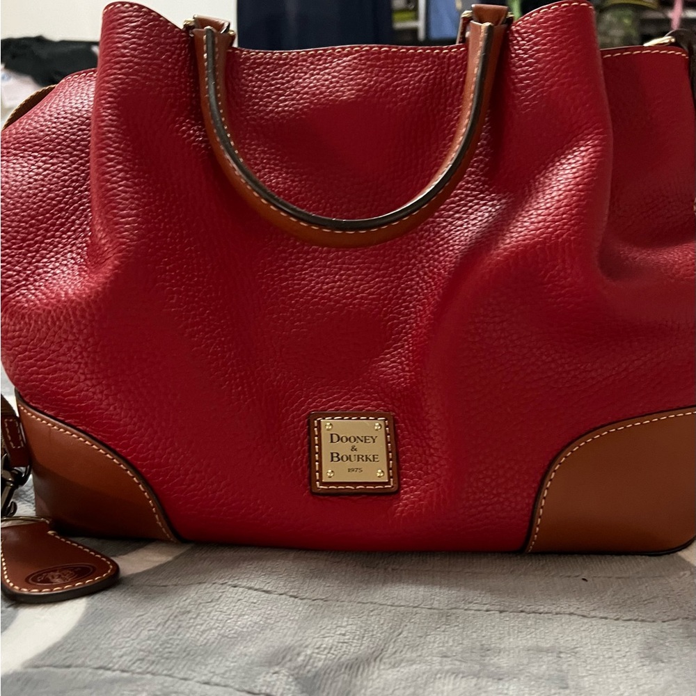 Dooney & Bourke in red, textured shoulder bag, cross body